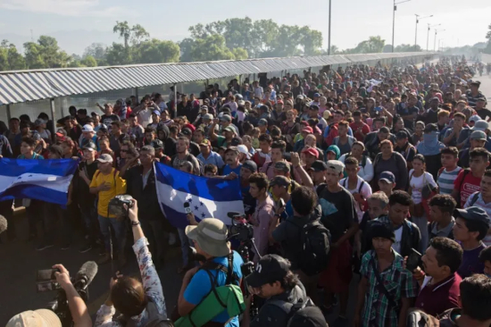 Honduran men march to USA
